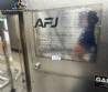 T�nel de enfriamiento con m�quina de recubrimiento y tanque de fusi�n de chocolate AFJ 2024