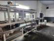 M�quina de llenado rotativa de acero inoxidable para bebidas carbonatadas y refrescos, 42 boquillas, KHS con lavadora Zegla.