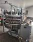 M�quina de llenado rotativa de acero inoxidable para bebidas carbonatadas y refrescos, 42 boquillas, KHS con lavadora Zegla.