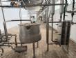 Tanque encamisado de acero inoxidable.  Con intercambiador de calor y bomba centr�fuga.