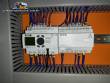 Llenadora rotativa gravimtrica de acero inoxidable con cabina