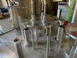 Llenadora rotativa gravimtrica de acero inoxidable con cabina