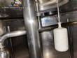 Llenadora rotativa gravim�trica de acero inoxidable con cabina
