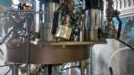 Lnea para mquina de llenado de aerosol Cosmar Omas