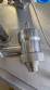 M�quina rotativa de acero inoxidable para llenado, dosificaci�n y sellado, con junta de aluminio, para tarros, vasos y botellas Delgo.