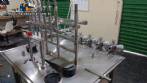 Llenadora lineal con sistema de llenado de 6 pistones