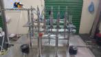Llenadora lineal con sistema de llenado de 6 pistones