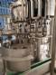 M�quina de llenado rotativa Zegla con sistema de enjuague y taponado de tres bloques
