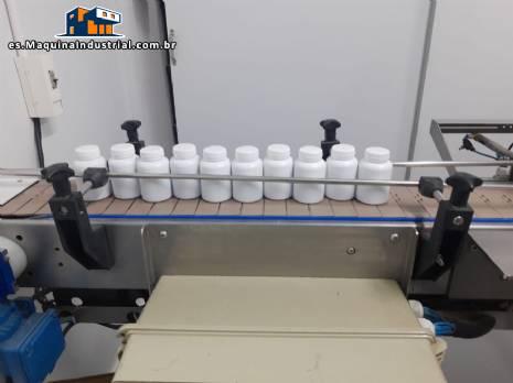 L�nea de llenado con contador de c�psulas y m�quina de tornillo