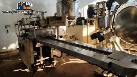 Máquina automática de envoltura de celofán Otto Haensel V3 para el envasado de cajas de té, chocolates, perfumes, galletas, cremas, caramelos y dulces. Máquina automática de envoltura de celofán Otto Haensel V3 para el envasado de cajas de té, chocolates, perfumes, galletas, cremas, caramelos y dulces.