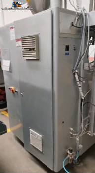 Máquina de envasado vertical con dosificador para productos en polvo Máquina de envasado vertical con dosificador para productos en polvo